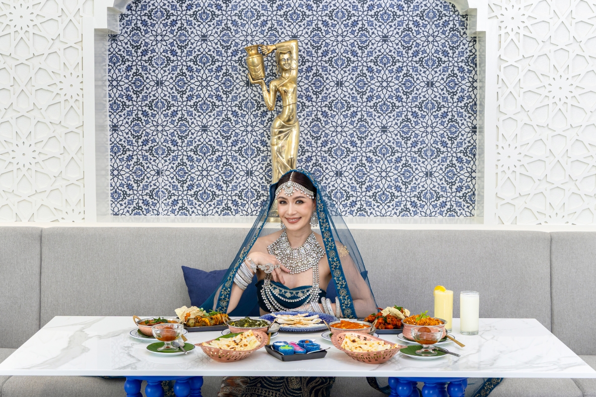 asian woman in sari at newly renovated maharani indian restaurant in pattaya