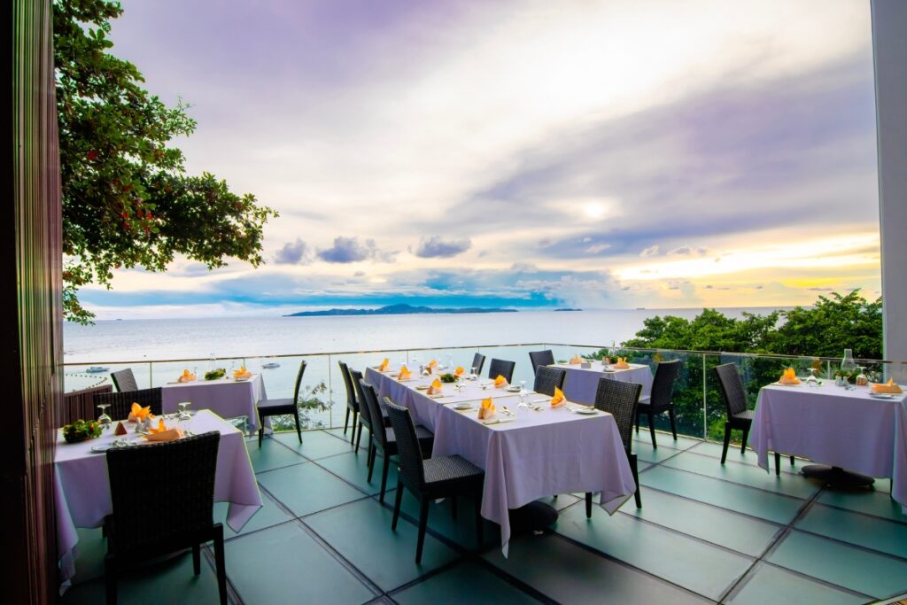 Sea views of the outdoor seating area at Larn Thong