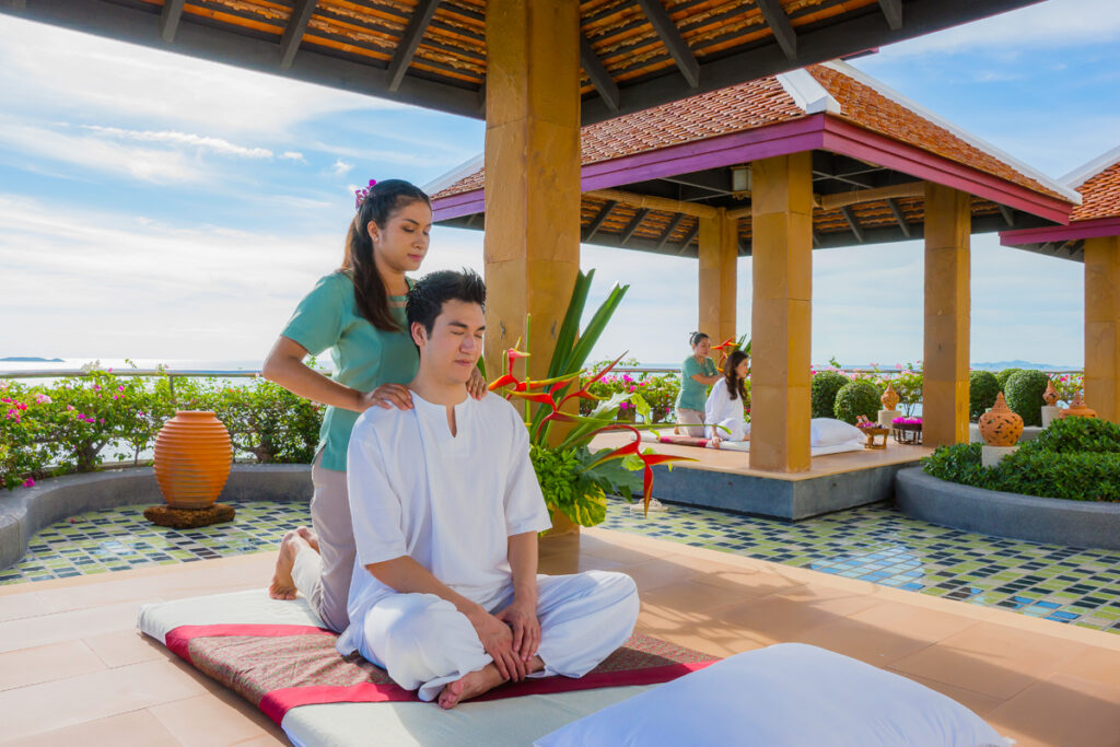 massage therapist treating a customer at cliff spa