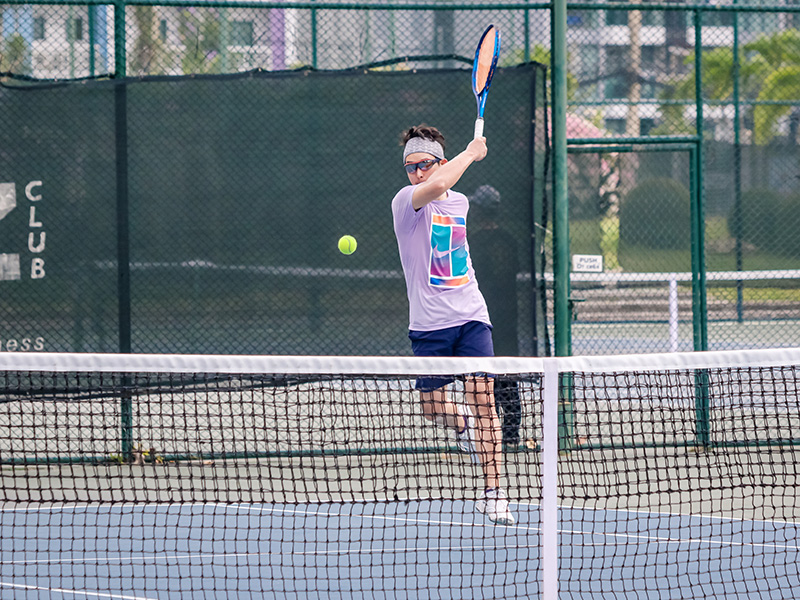 royal cliff ceo playing tennis at the 16th fitz club tournament