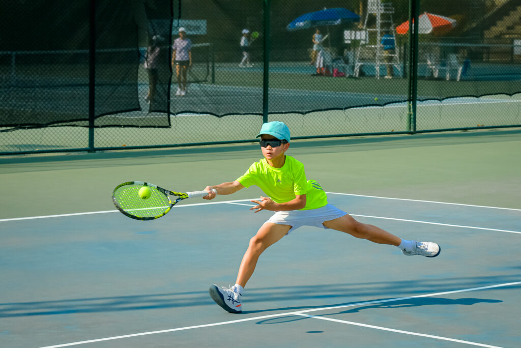 young athlete playing during our junior tennis championship in pattaya