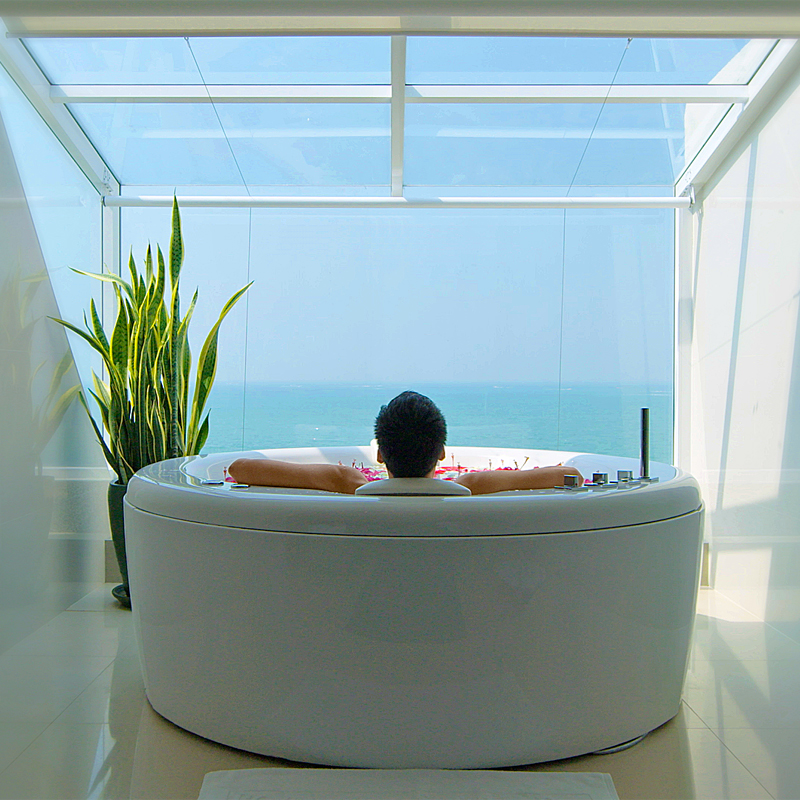 relaxing in jacuzzi at presidential platinum suite