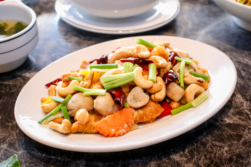 thai dish with stir-fried chicken and cashew nust