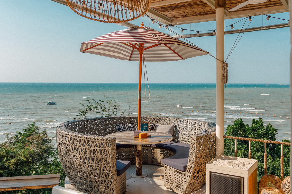Enjoy shaded outdoor seating at the Lunar Beach House