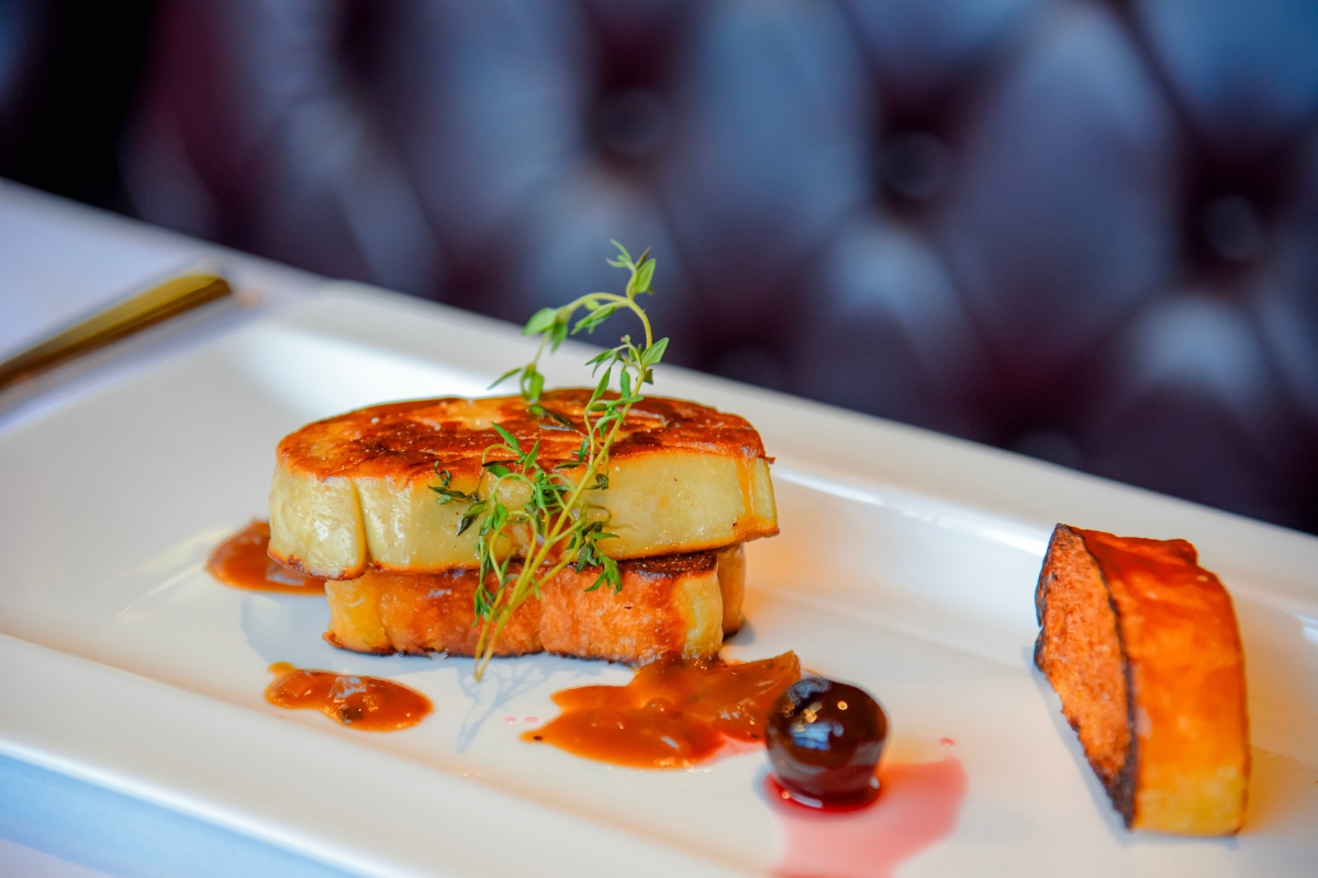 foie gras over toasted bread at luxury hotel