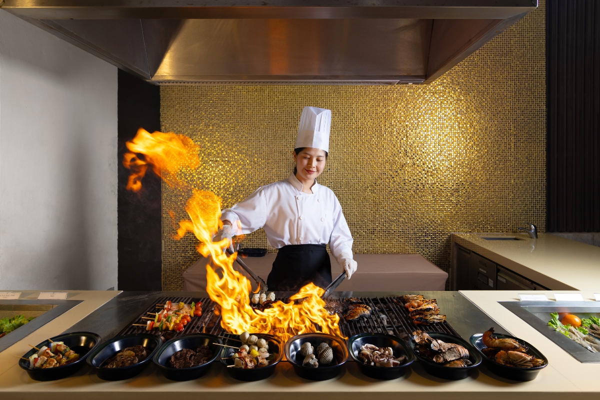 chef preparing meats at the saturday grand bbq buffet